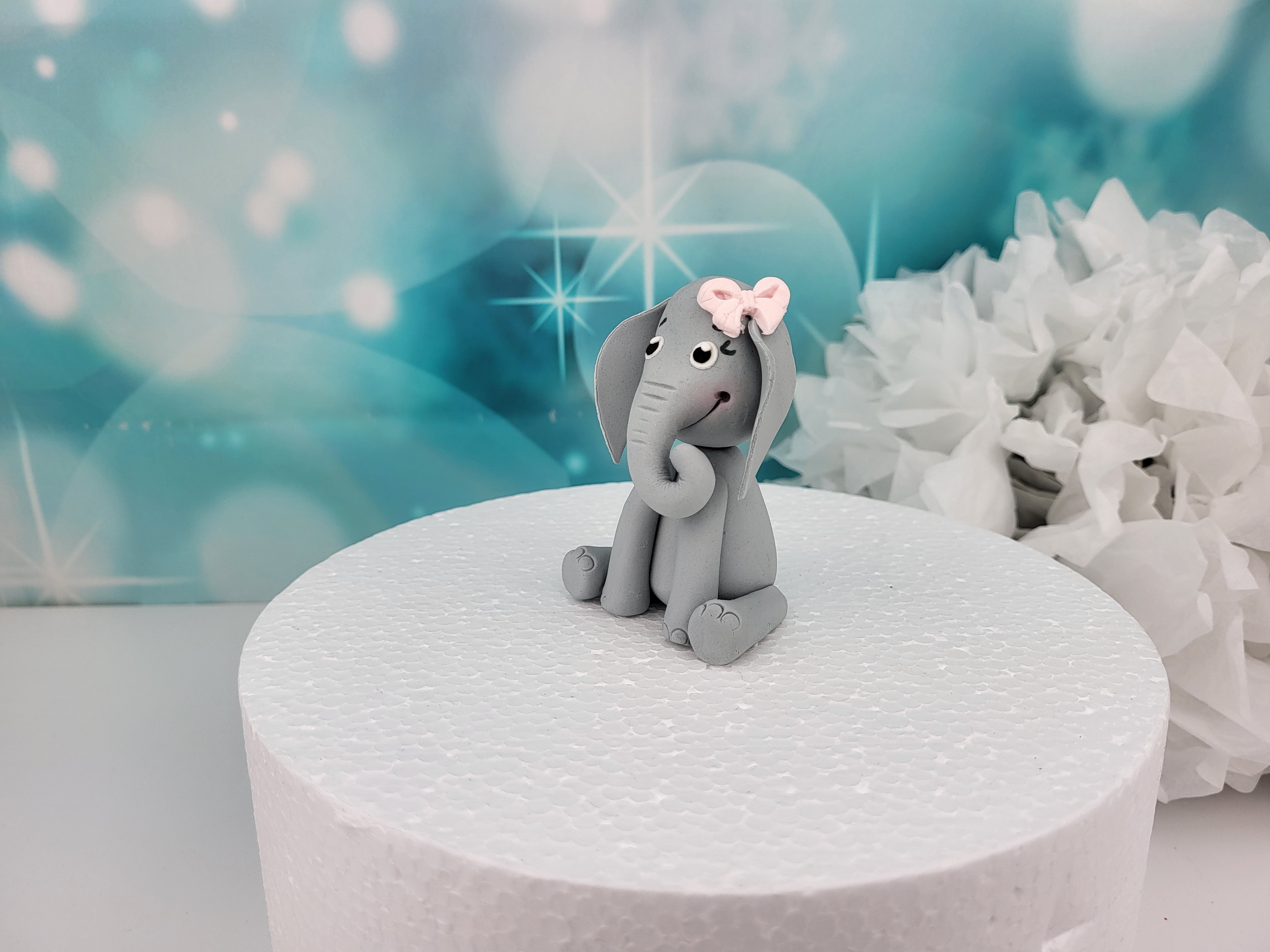 Tortenfigur Elefant mit rosa Schleife